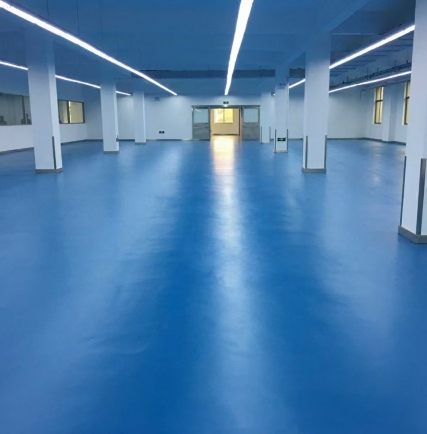 Intermediate epoxy coating for concrete floor leveling