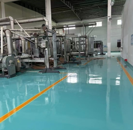 Wear resistant epoxy floor coating in factory workshop