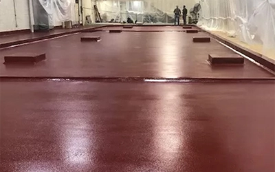 Polyurethane flooring system for demanding industrial environments