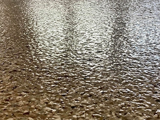 Aliphatic polyaspartic coating system providing UV stability, chemical resistance, and durable performance for high-performance flooring applications