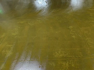 Epoxy moisture mitigation primer system for controlling moisture vapor transmission in concrete substrates before resin flooring installation
