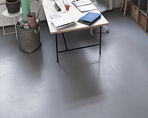 ESD conductive broadcast flooring system for semiconductor facilities and static-sensitive production areas