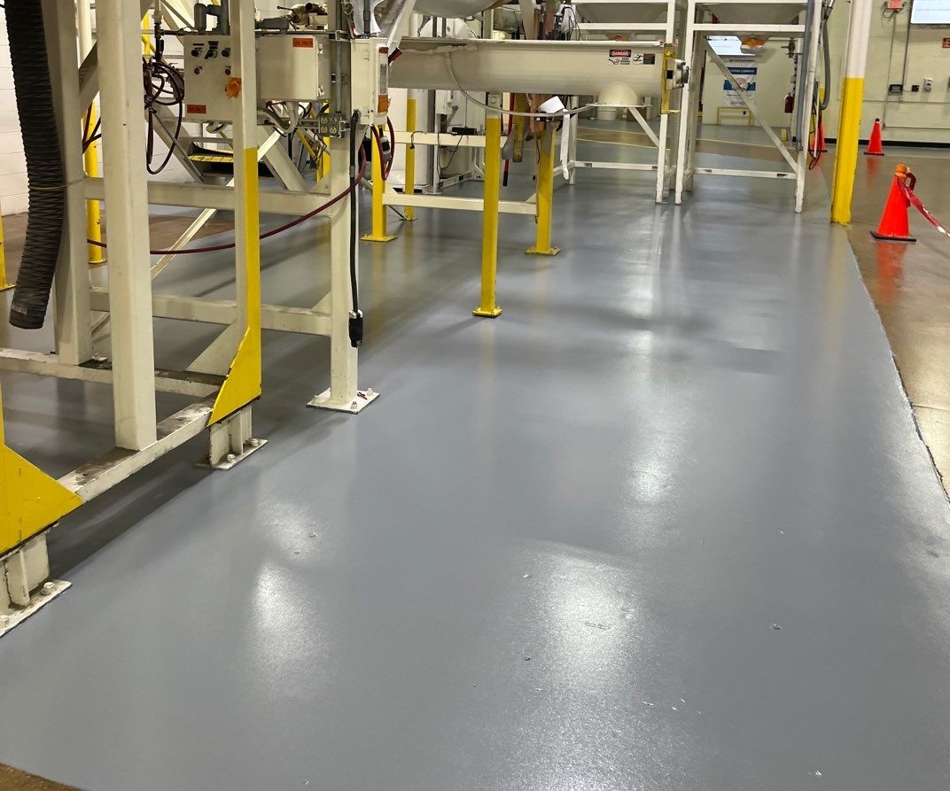Heavy-duty industrial and manufacturing factory resinous floor coating
