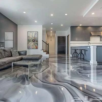 Metallic epoxy flooring system with decorative resin finish for commercial interior spaces