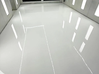Polyaspartic garage flooring system with chemical resistance, UV protection, and fast installation for vehicle traffic areas