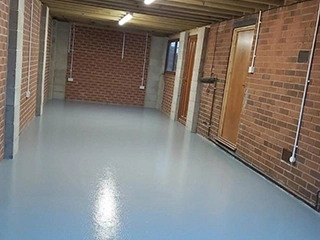 Polyurethane moisture resistant flooring system with flexible, durable protection for demanding industrial applications