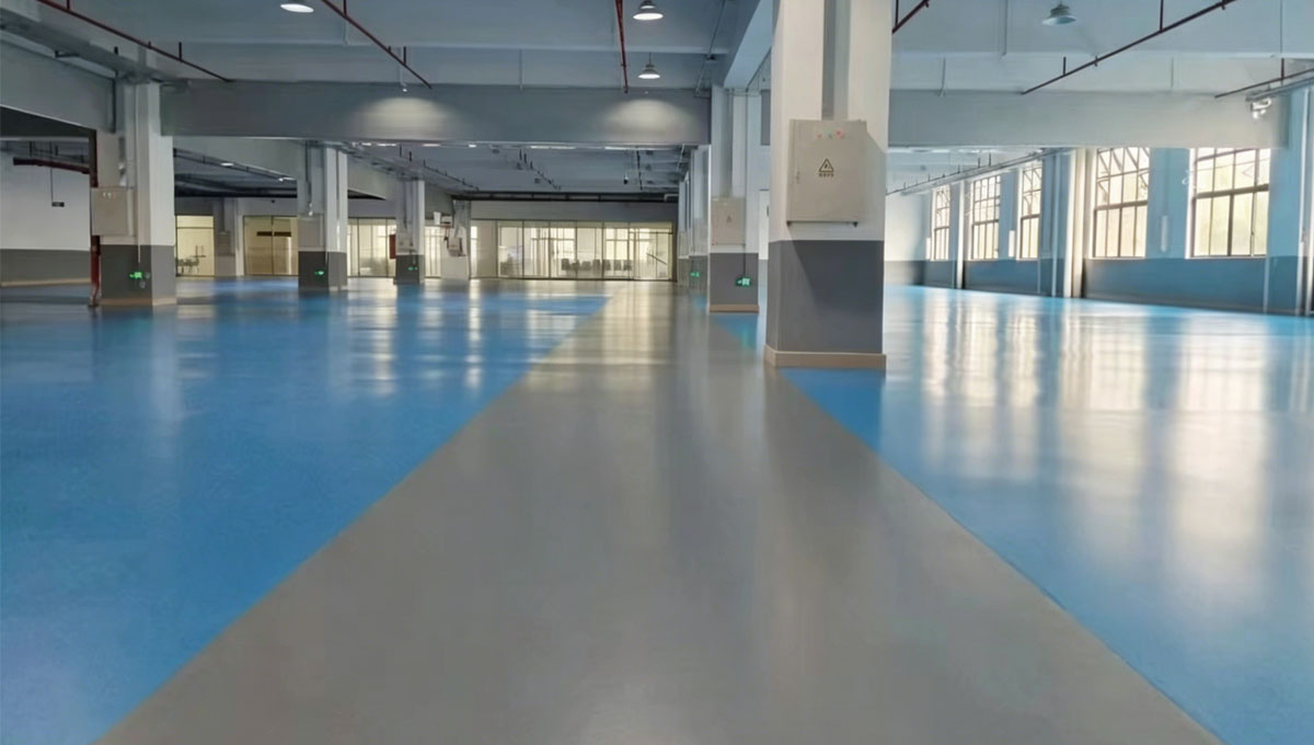 UV stable and chemical resistant polyurethane floor topcoat system on an exterior logistics ramp