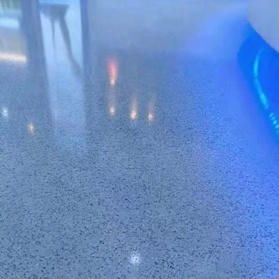 Quartz broadcast epoxy flooring system with slip resistant and abrasion resistant surface performance